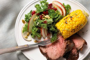Beer-Soaked Beef Rotisserie Roast with Skillet Corn & Kale Salad